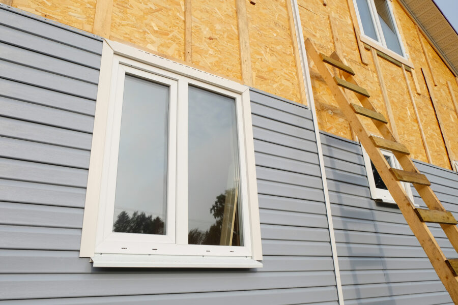 How to Install Vinyl Siding Around Windows