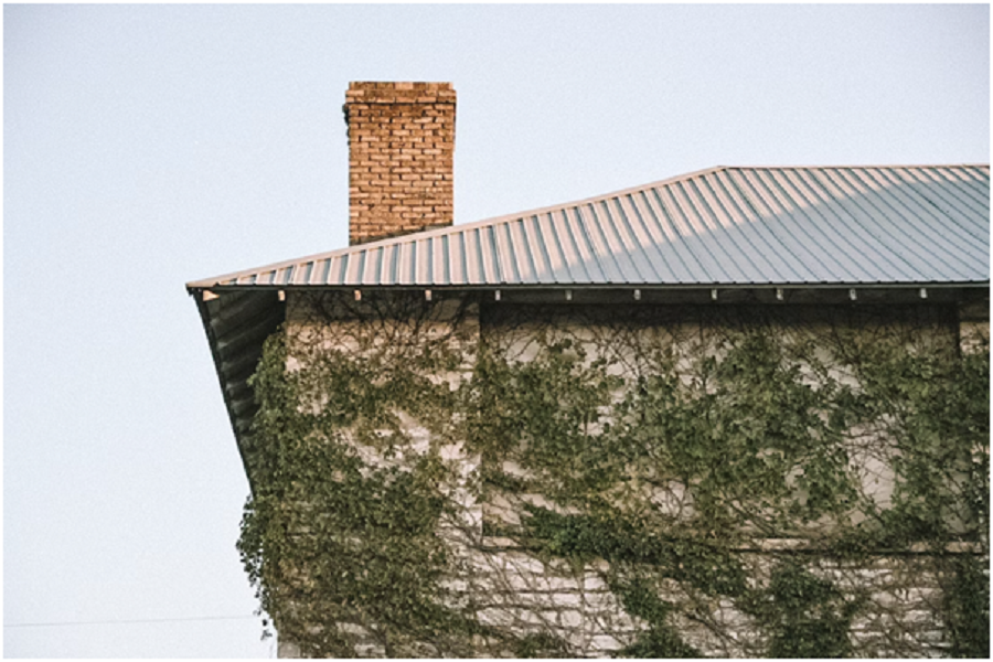 Brick chimney in house.